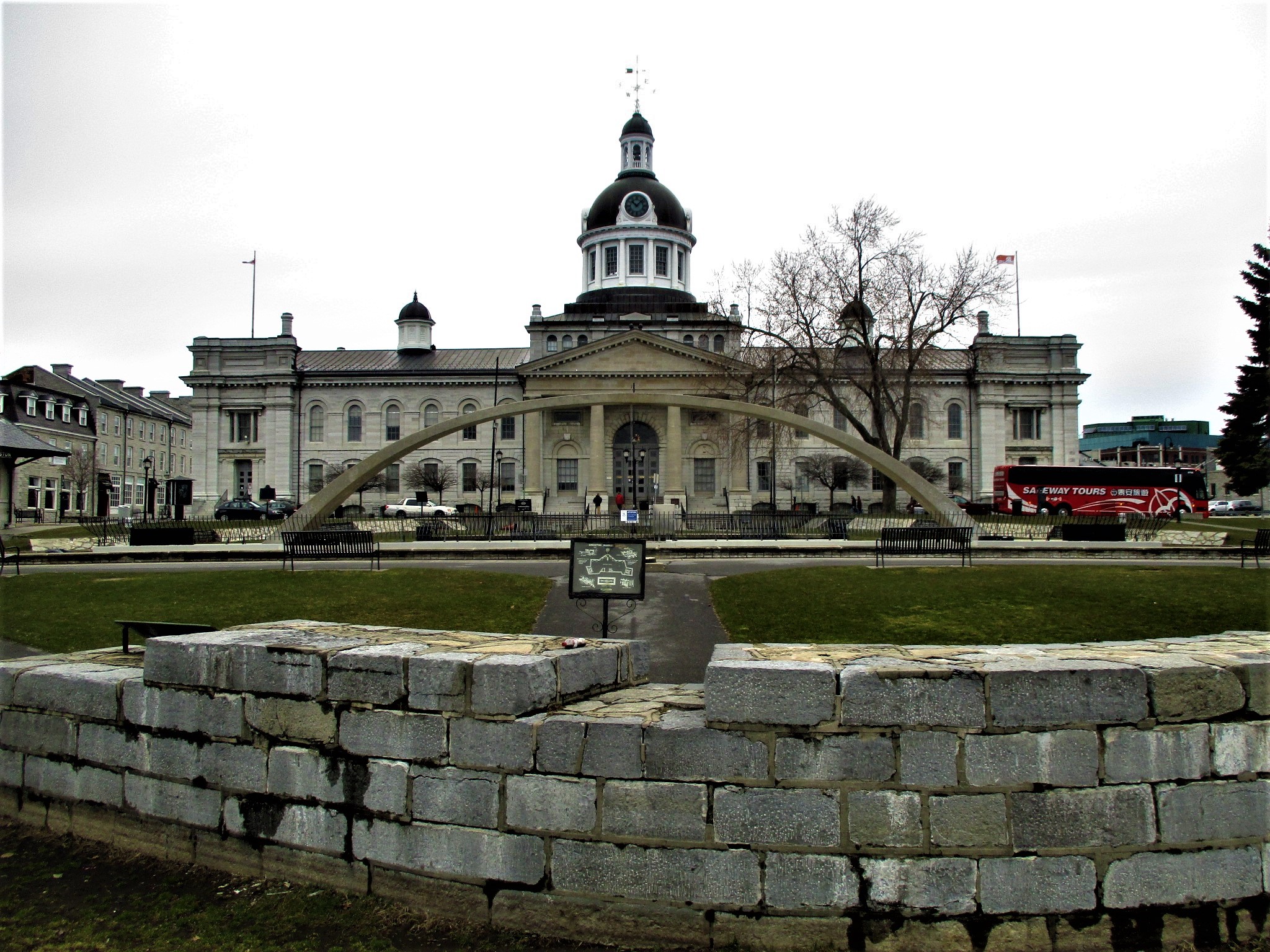 Kingston City Hall's domed limestone facade and the Kingston Market arch